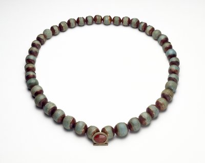 Faience Cylinder and Necklace with Gold, Turquoise and Carnelian Pendant in the Shape of a Shen-Ring, the Sign for Eternity by Middle Kingdom Egyptian